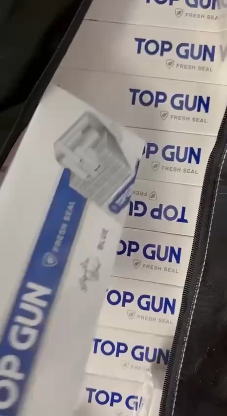 37741911eeeaf1138de3befeaaec721a481aaf43d16de8a10be9e6d6ec19bbac.png Top Gun Blue 20s Cigarettes x 10 Packs /1 Carton